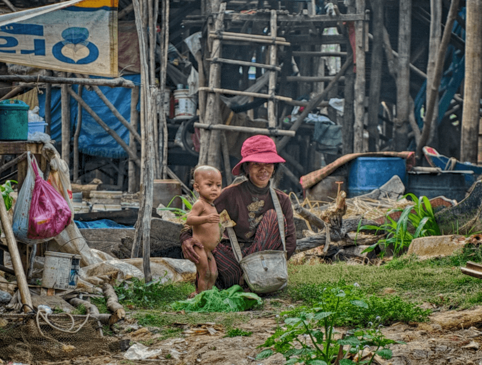 Photo of a child and their mother in Cambodia